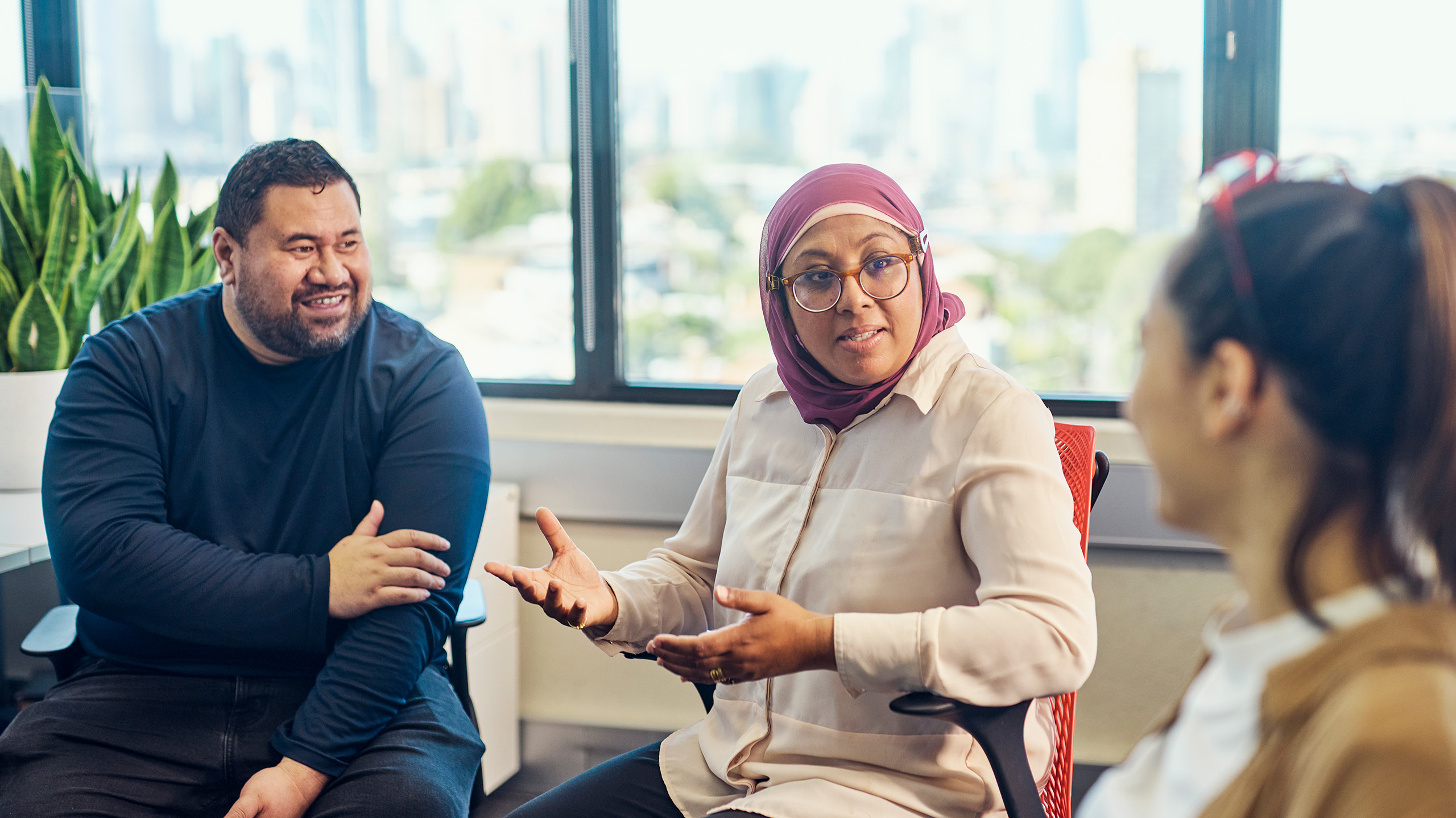 Victorian couple meets with a member State Trustees in an office environment to discuss the various legal and financial services available.